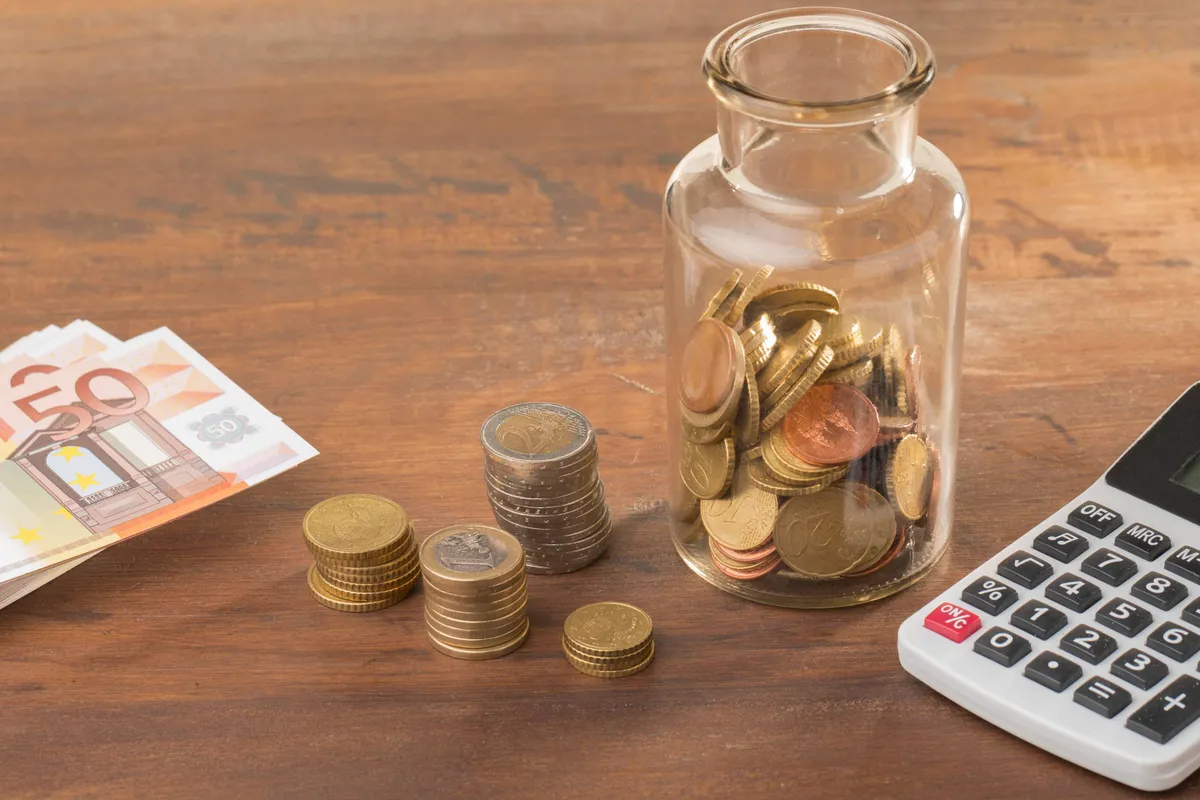 economy savings jar with calculator