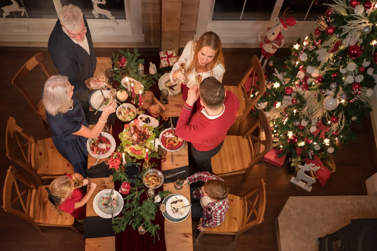 people-enjoying-festive-christmas-dinner-together