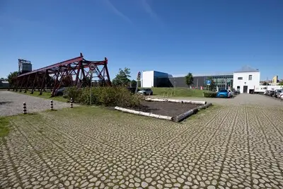 Nieuwbouw Jan van Brabant College bij Cacaofabriek te duur: gemeente en school maken pas op de plaats