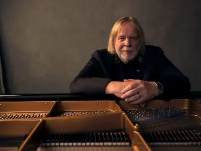 Na 158 elpees, drie hartaanvallen en veel grappen en grollen houdt Rick Wakeman eindelijk op