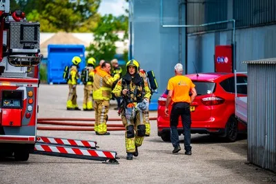 Brand in machine bij bedrijf op Industrieweg in Alphen aan den Rijn