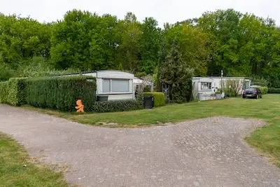 Campingeigenaar en buren in Udenhout vechten elkaar nu voor de rechter de tent uit over uitbreiding: ‘We moeten het echt stoppen’