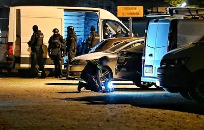 Politie valt met vier arrestatieteams pand in Tilburg binnen: drie mannen aangehouden, wapens en drugs gevonden