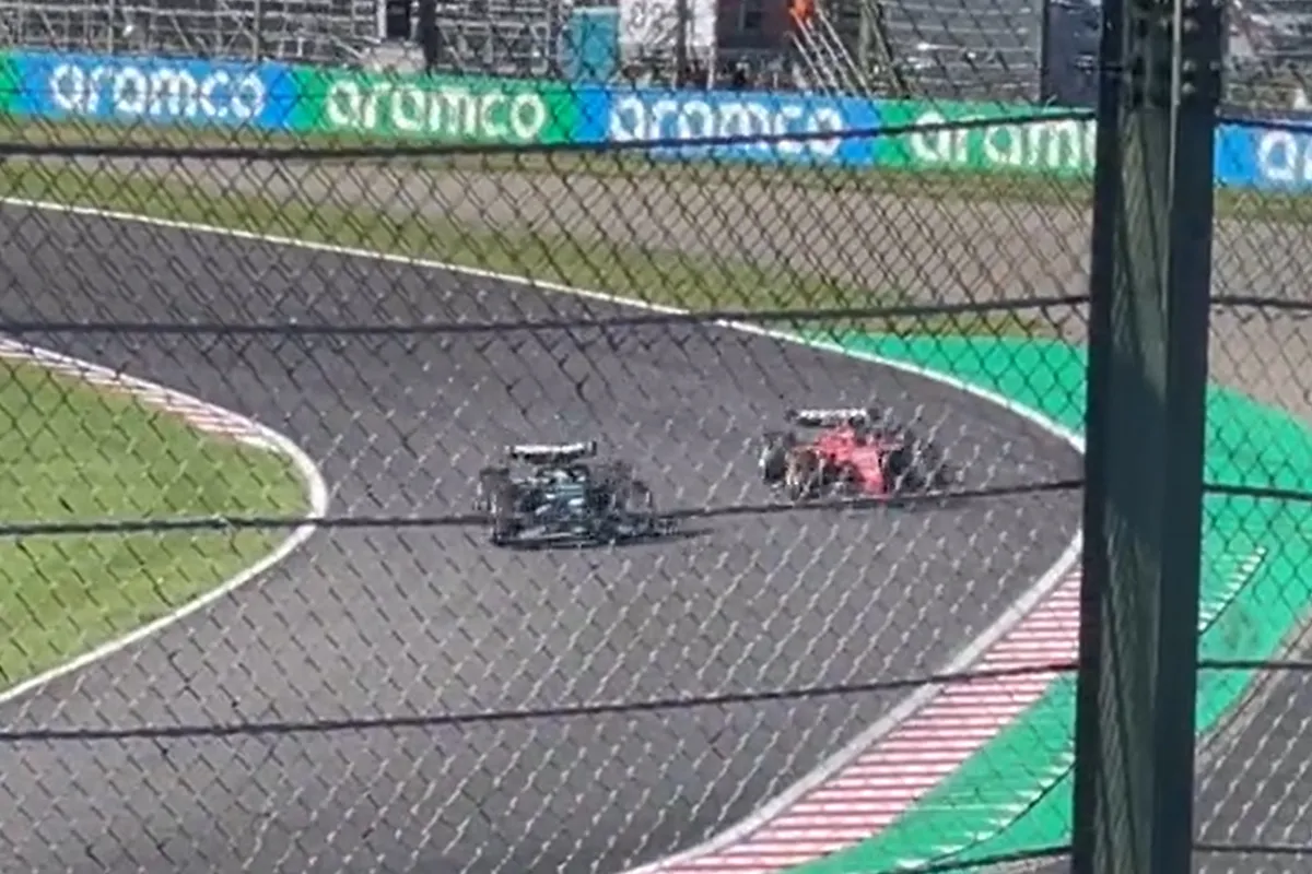 russell leclerc bocht 1 suzuka