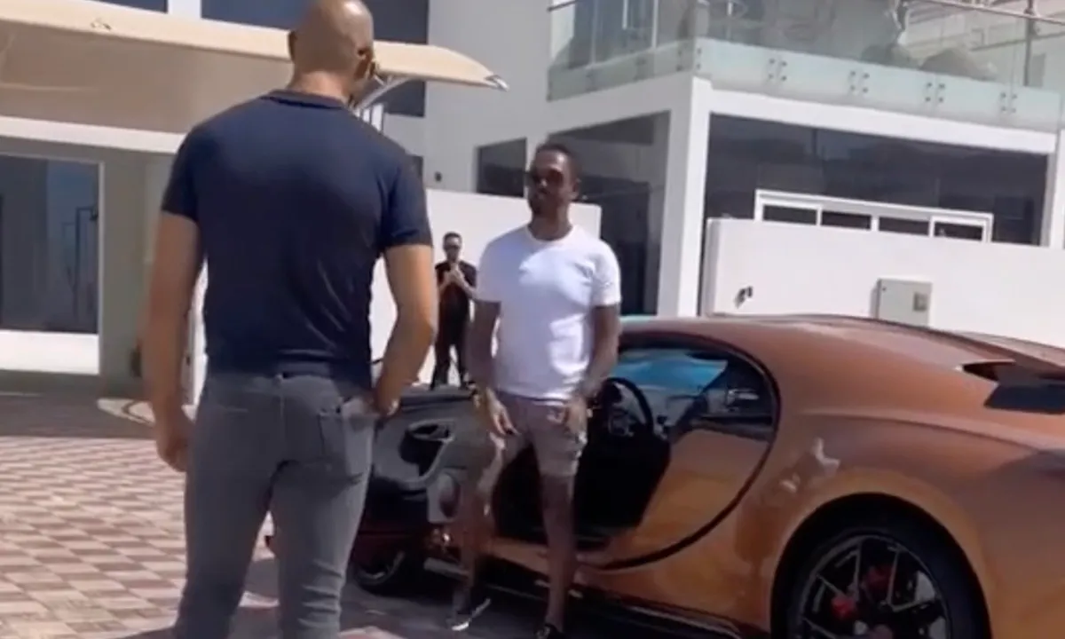 Andrew Tate neemt Bugatti Chiron met Nederlands tintje weer in ontvangst