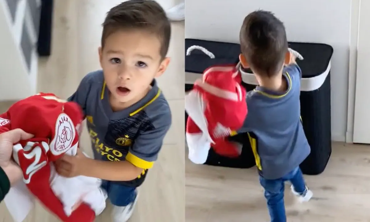 Kleine Feyenoord-fan weet wel raad met Ajax-shirt