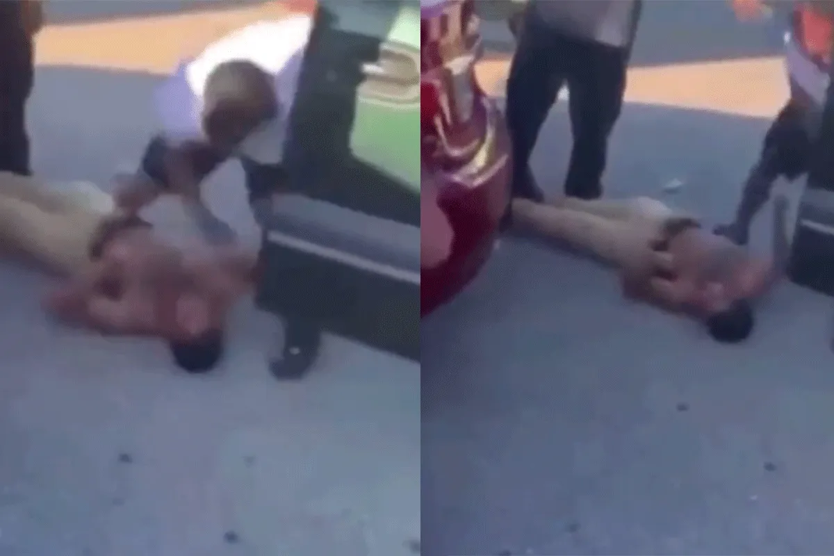 Boze dude mept 'vervelio' een betonhoofd! 'Niet toeteren' (video)