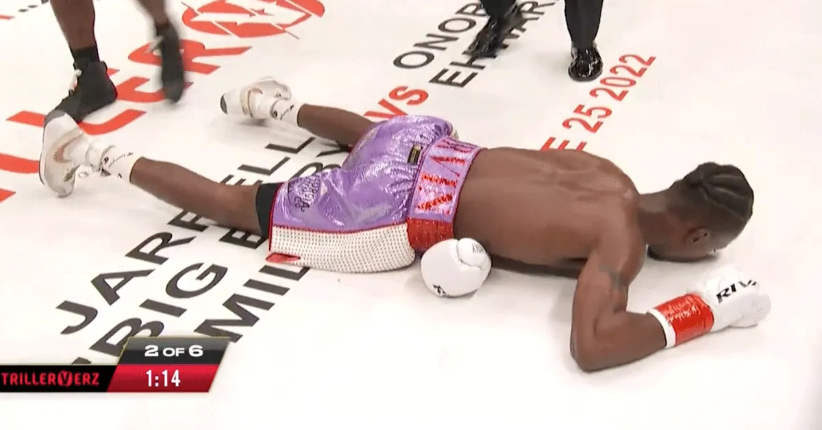 'KO'! Zoon bokslegende Holyfield MEPT rivaal hersenschudding (video)