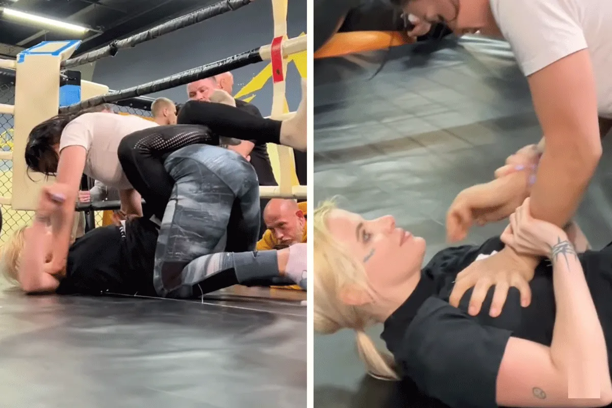 Tieten trucje: Vrouwelijke kooivechter verrast rivaal (video)