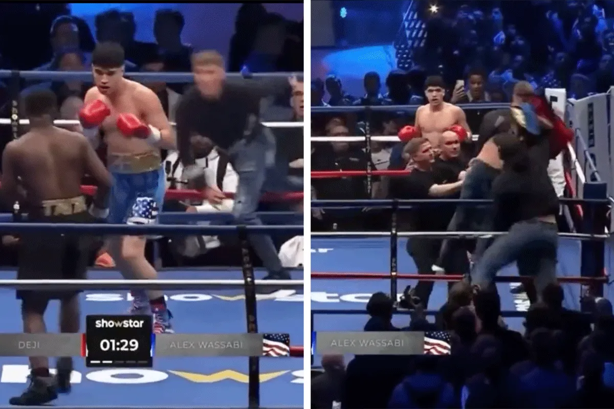 Fan krijgt klappen na binnenstormen boksring (video)