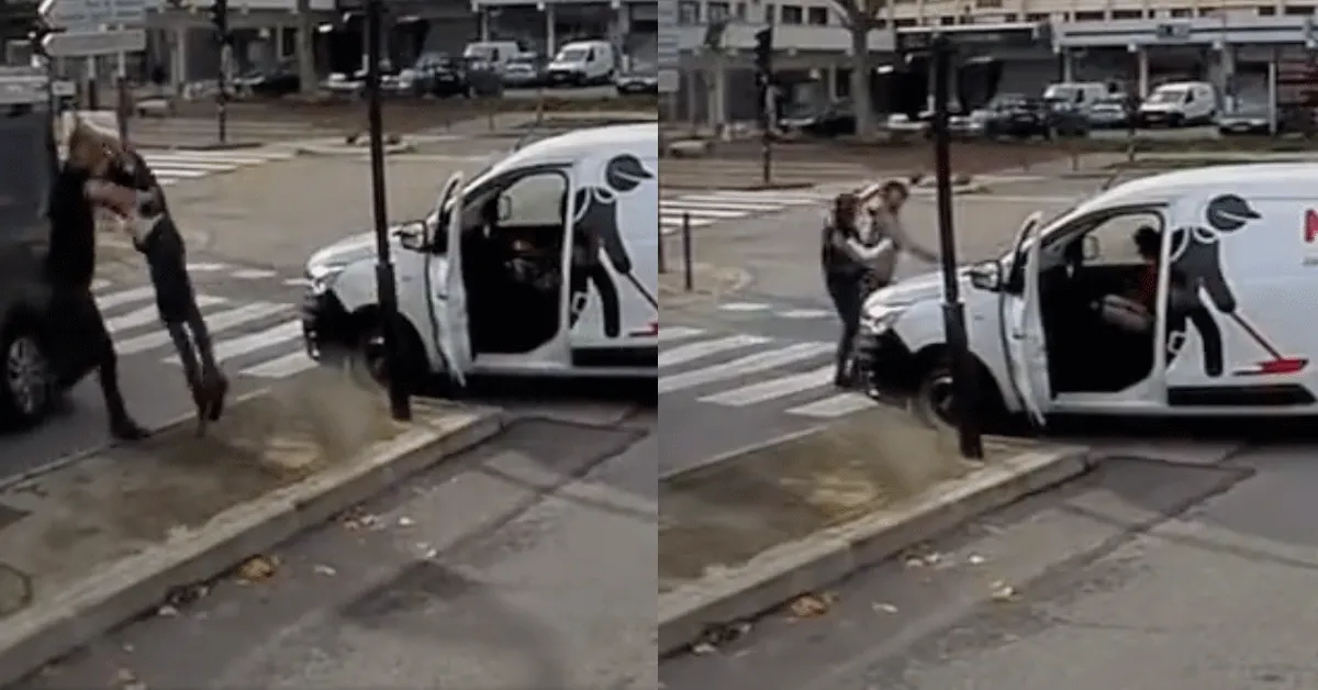 Verkeershufter klapt schoonmaker onderuit! 'Roodlicht' (video)