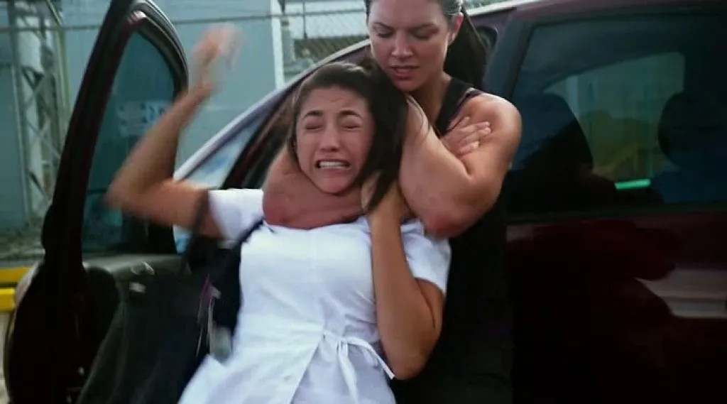 Hoe je te verdedigen tegen een achterwaartse nekklem