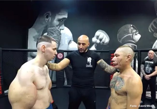 Plofkip bodybuilder krijgt pak slaag van MMA-vechter (video)