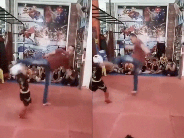 VIDEO: Idiote kickboksleraar trapt jochie door de zaal