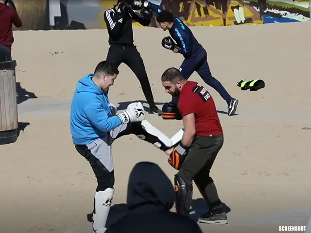 ? | Boze reacties om groepsles kickboksen op strand Scheveningen