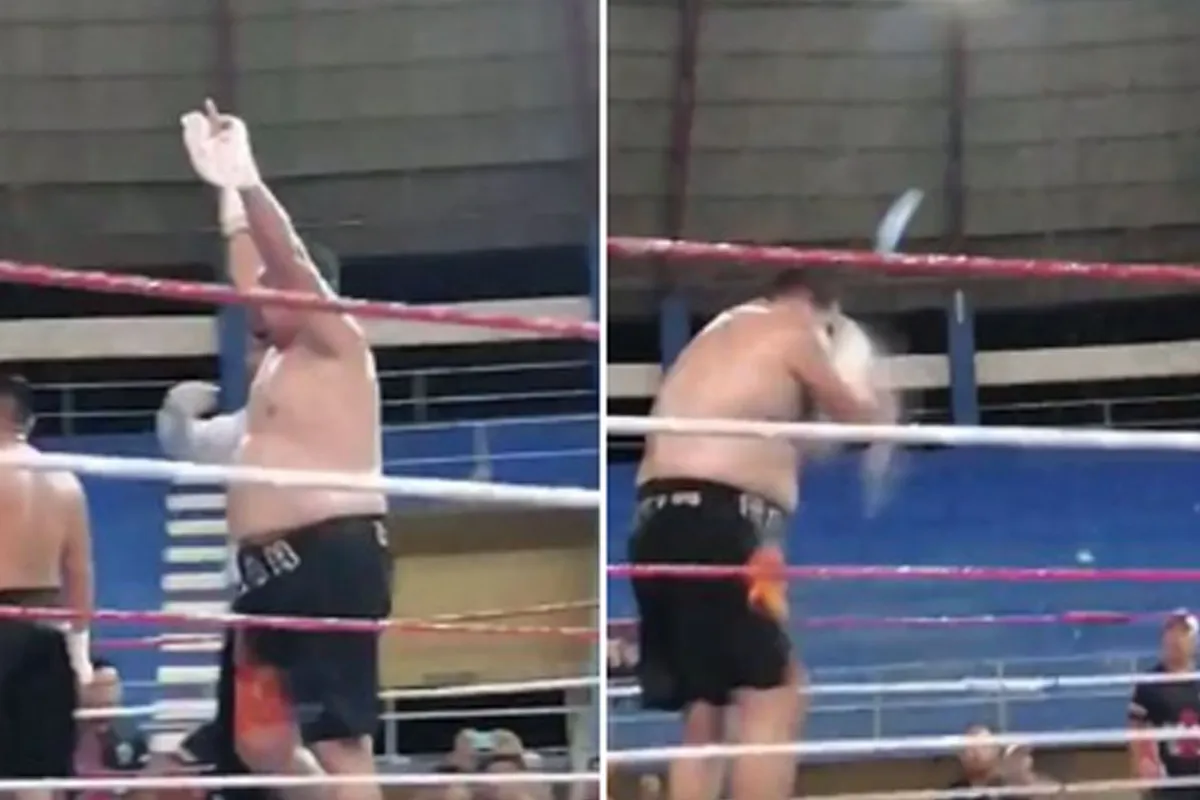 Opzouten! Bokser in ring bekogeld door boze fans aartsrivaal