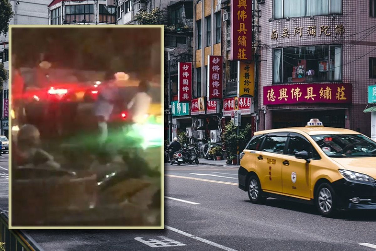 Taxichauffeur vecht met passagier op straat! 'Muay Thai' (video)