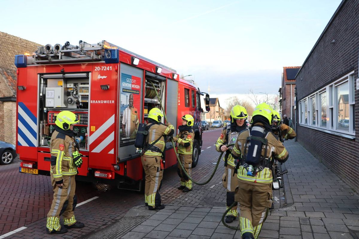 Perscontainer vat vlam in magazijn Aldi Kaatsheuvel