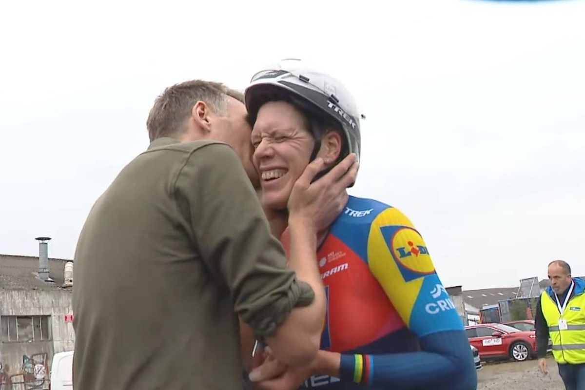 Ellen van Dijk and Joshua Tarling celebrate victory in France
