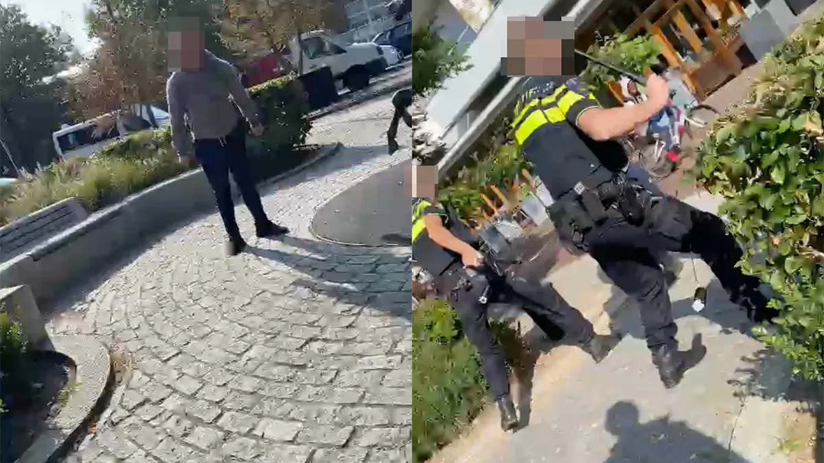 Ondertussen in Tilburg: Agenten hebben enige moeite om man te overmeesteren