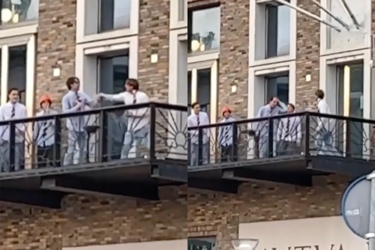 Vindicat-leden gaan gezellig op de vuist op balkon aan de Grote Markt in Groningen