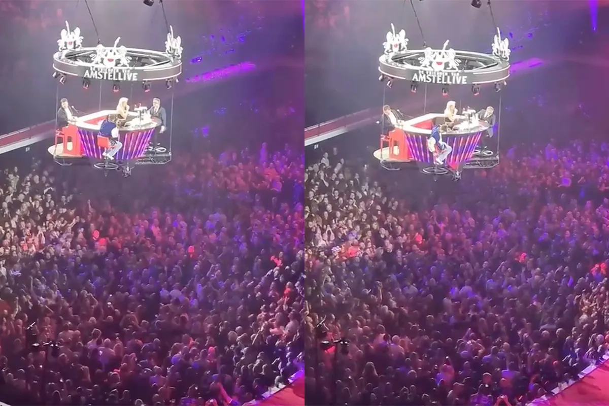 Flemming geeft een biertje aan tijdens 'De Vrienden van Amstel Live'
