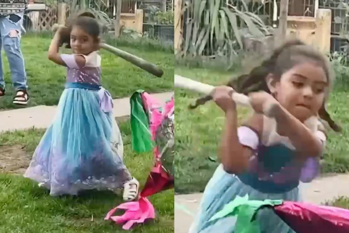 Kleine prinses gaat beast mode op een piñata