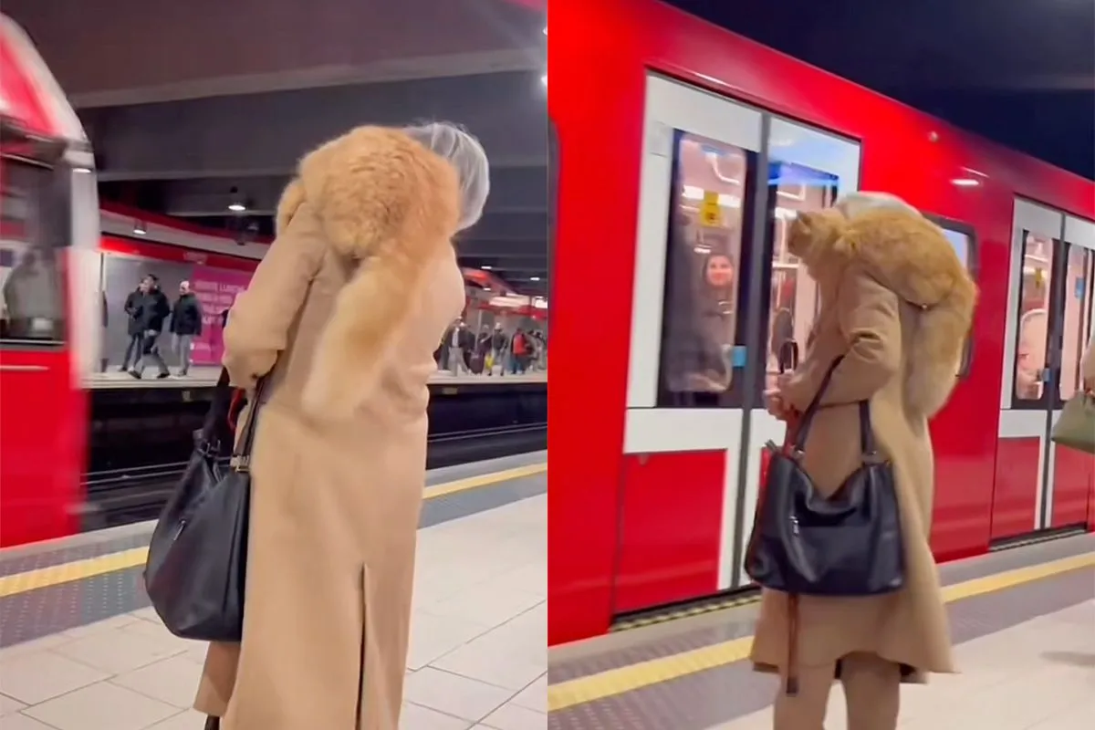 Je moet twee keer kijken hoe deze vrouw een kat als sjaal omzwiert