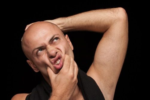 Krijg je een kale knikker of niet? Dat kan je volgens onderzoekers zien aan... de lengte van je vingers