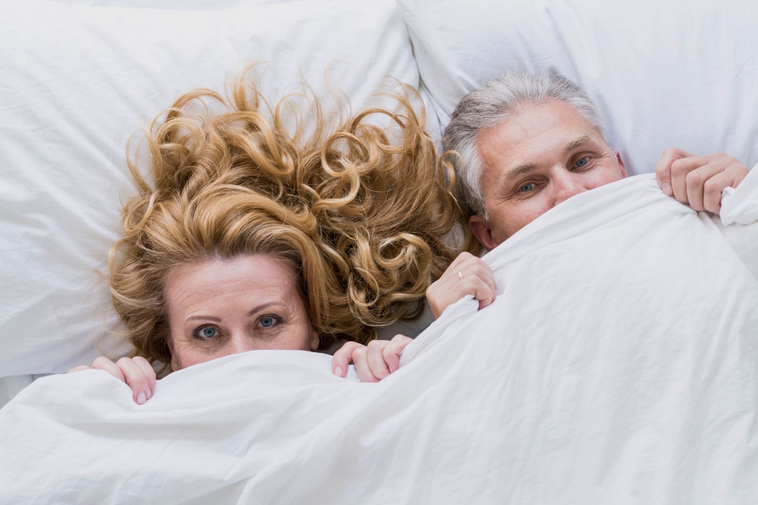 adorable senior couple bed sheets