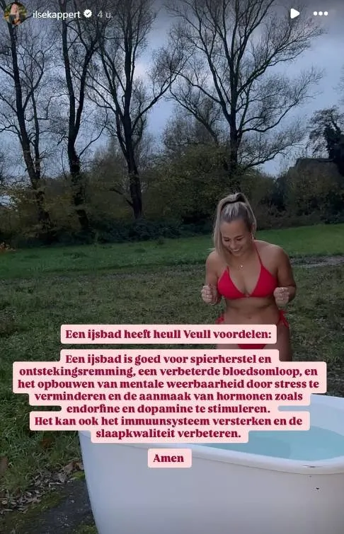 Boerin Ilse heeft het nog niet koud genoeg en duikt (in rode bikini) doodleuk in een ijsbad (foto's)