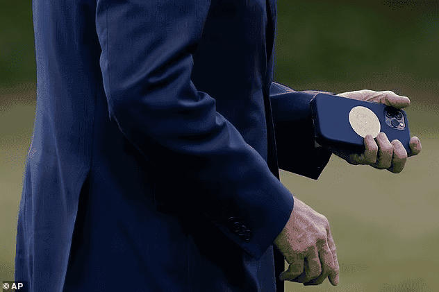 President Biden spotted using a “hush-hush” special iPhone with Presidential Shield