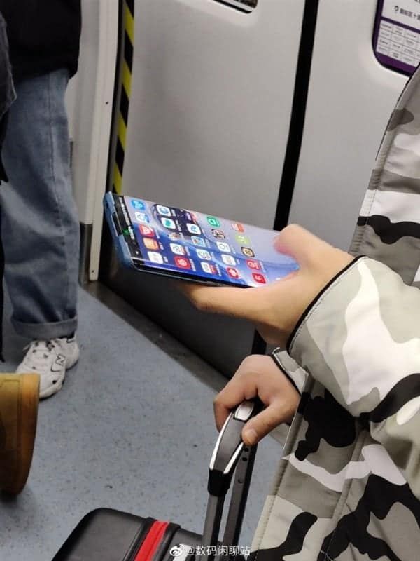 Huawei P40 Pro real image spotted in a subway with a dual punch-hole display