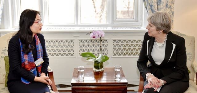 Huawei's chairperson, Sun Yafang and British Prime minister, Theresa May.