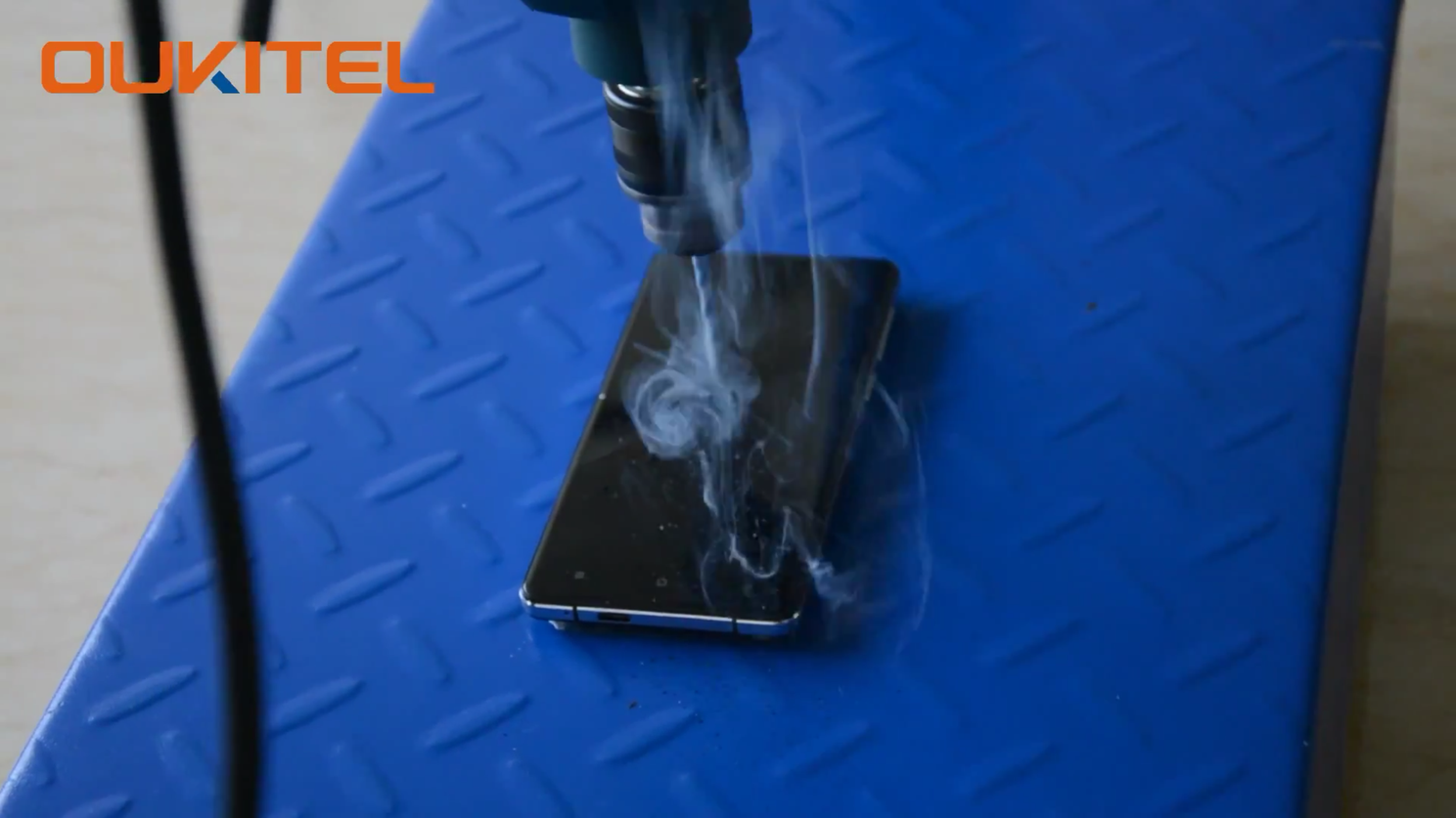 Oukitel K4000 undergoes power drill test, continues playing