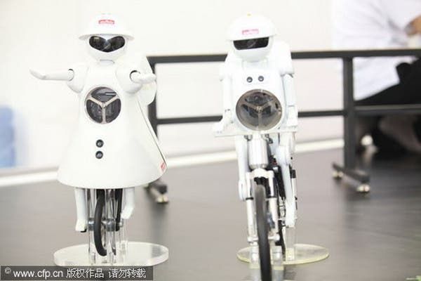 Murata Boy and his Cousin Open China Hi-Tech Fair With Cycling Antics