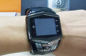 This Watch Phone Won't Deflect Bullets, But It Will Take Shady Photos