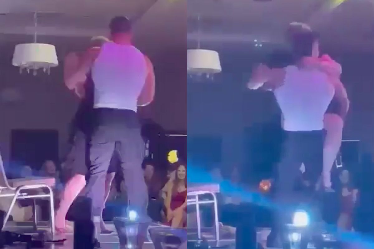 Vrouw is wel heel opgewonden als ze door stripper op podium wordt getild