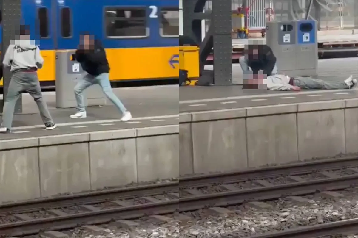 thumb_vk_Schokkende_beelden_van_vechtpartij_op_Amsterdam_Centraal_tijdens_Koningsdag_man_gaat_hard_neer_en_blijft_roerloos_liggen