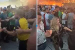 Twee gasten waren even het mantra van Tomorrowland vergeten en doen een 'liefdesdansje' in (mislukte) WWE-stijl