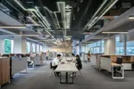 Ook iets voor bij ons? In China kunnen werklozen een kantoor huren om... te doen alsof ze werken