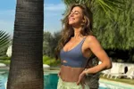 'Lekkerste fitgirl van Nederland' Lotte van Leeuwen imponeert in bikini: "Je zou zo een Bond-girl kunnen zijn!" (foto's)