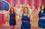 Net iets té 'marginaal'? Kamping Kitsch Club biedt excuses aan na AI-beelden van K3 met hoofddoek en in bikini