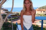 'Real Housewife' Kiki showt haar indrukwekkende lijf in badpak en monden vallen open: "Wauw, zo afgetraind!"