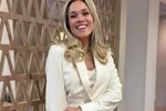 Ex-Miss België Virginie Claes en een diep decolleté... een winnende combinatie! (foto's)