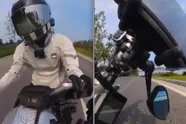 Hallucinant: motard wordt gekatapulteerd omdat autobestuurder op smartphone aan het spelen is