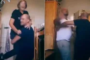 Vrouwelijke cipier op het matje nadat ze danst in Mechelse cel met gevangenen en kusjes krijgt