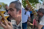 Professionele zuipschuit laat even zien hoe hij omgaat met een meter bier