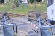 Waanzinnige beelden: fietser in Waver kruipt door oog van de naald aan gesloten overweg