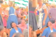 Oktoberfest kan niet meer stuk voor deze kerel wanneer hij onder rok van wulpse dame mag loeren